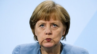 Merkelden gözaltılara sert tepki