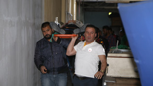 Zanlıyı kovalayan polis yüksekten düştü