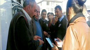 Dolandırılmaktan oğlunun şüphesiyle kurtuldu