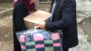 Suriyeli bin aileye yardım