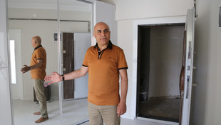 Erzurum'da iki şehidin ailelerine ev hediye edildi