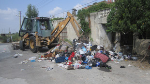 Evden iki kamyon çöp çıktı