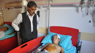 Yaralı çocukların bagajda taşınması kameralara yansıdı