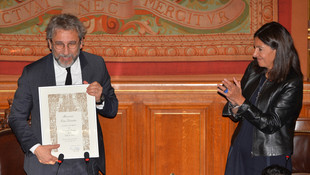 Aranan Dündar'a Paris'ten fahri hemşehrilik