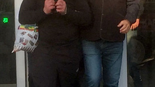 Çarşafla hastaneye girmeye çalışırken gözaltına alındı