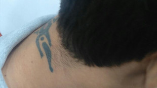 Kapkaç zanlısını dövmesi ele verdi