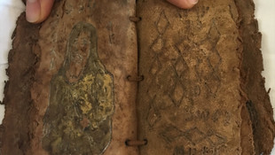 Tarihi eser görünümü verilmiş defterle dolandırıcılık iddiası