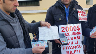 Dövizini bozdurup hediye milli piyango biletini aldı
