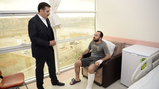 Gümrük ve Ticaret Bakanı Tüfenkci'den yaralı askere ziyaret