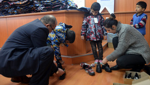 İhtiyaç sahibi öğrencilere giysi yardımı