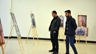 Teröristlerin ateşe verdiği tarihi caminin fotoğrafları sergilendi