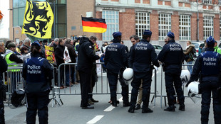 Merkel, Belçika'da protesto edildi