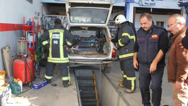 Tamirhanede otomobilin LPG tankı alev aldı: 3 yaralı