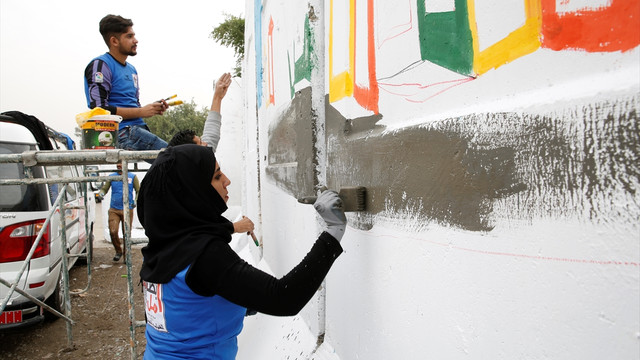 Irak'ta beton bariyerlerle barış ve umut mesajları veriliyor